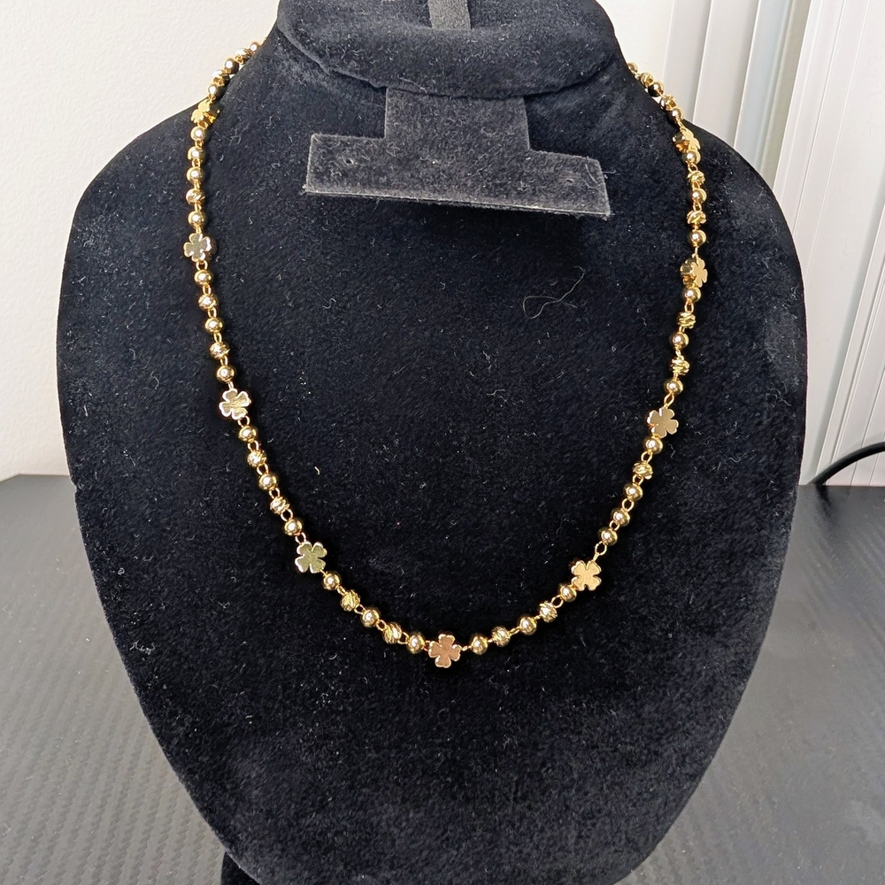 Elegant Gold Beaded Necklace with Floral Accents